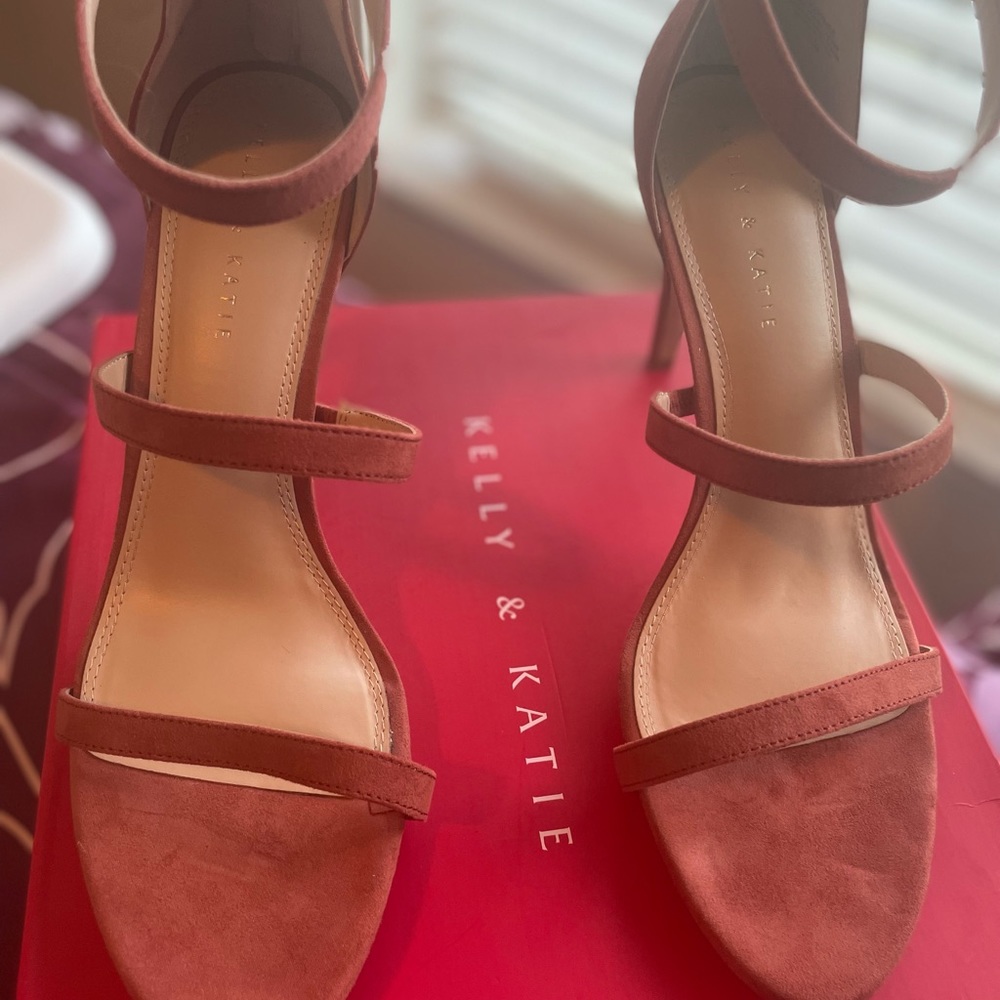 Orange strapped cute heels.